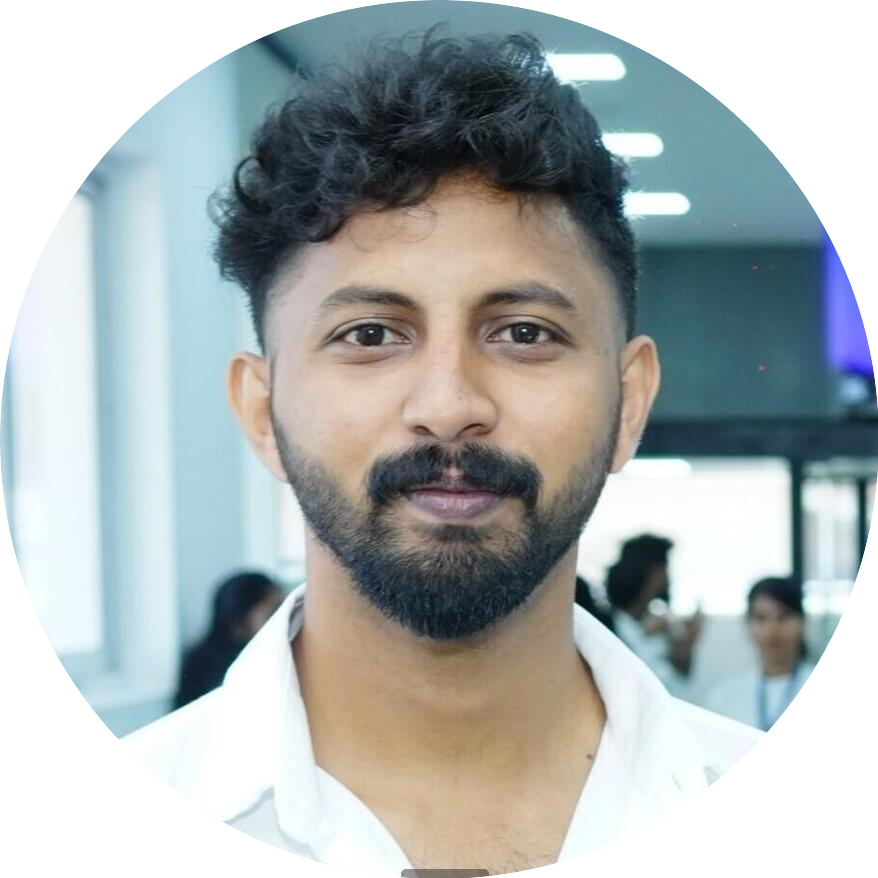 Portrait of Renjith, a team member at OptimySME, smiling in a professional setting.