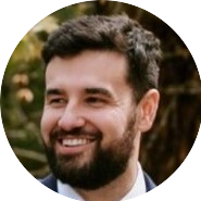 Portrait of Brad, a team member at OptimySME, smiling in a professional setting.