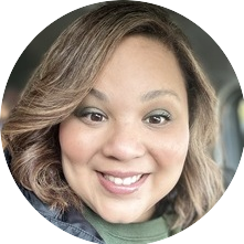 Portrait of Claudelle, a team member at OptimySME, smiling in a professional setting.