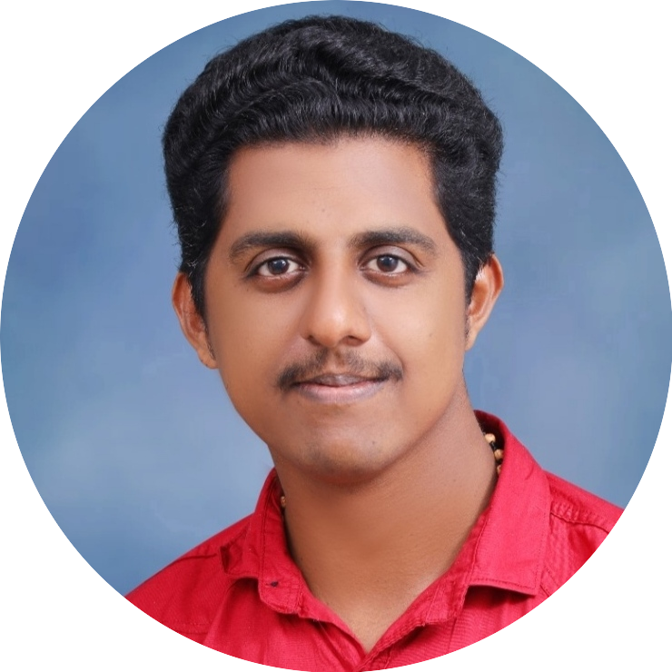 Portrait of Jithin, a team member at OptimySME, smiling in a business environment.