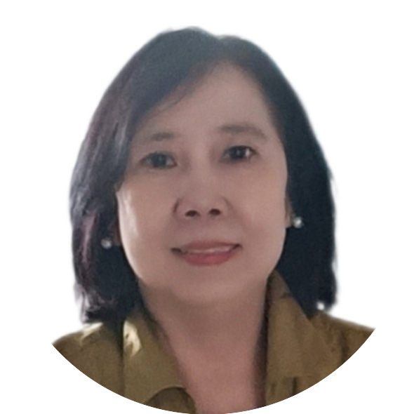 Portrait of Josephine, a team member at OptimySME, smiling in a business environment.