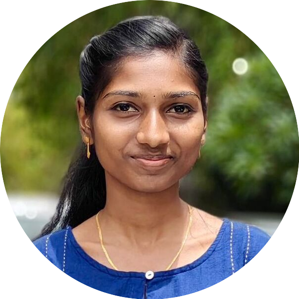 Portrait of Aneesha, a team member at OptimySME, smiling in a professional setting.