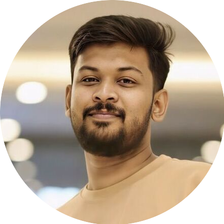 Portrait of Madhav, a team member at OptimySME, smiling in a professional setting.